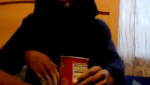 My friend Stacey pees in cup and then rubbed Pee on her Pussy in her shorts.