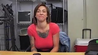 Short haired tattooed chick is banged hard against the desk