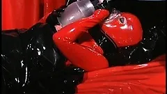 Latex bound slave gets her hair shaved off by her evil mistress