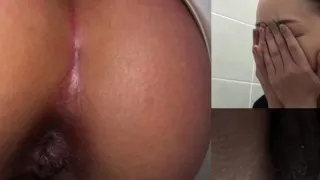 Asian peeing on stick