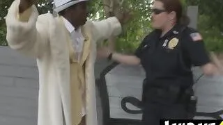 Pimp is held still while milf cop sucks and takes his big black cock