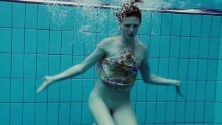 Hot big titted teen Lera swimming in the pool