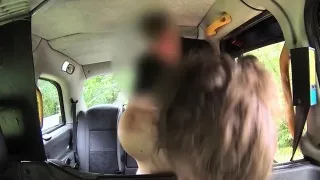 Busty tattooed gal fucks in taxi