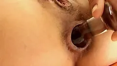 Naked hairy brunette gets her nipples and clit pinched and sucked