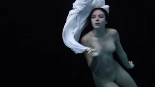 Redhead beauty in the white dress