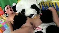 She gets fucked by her panda friend and his strapon dildo dick