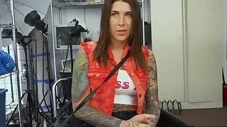 Tattooed chick sucks on directors big cock before he drills her hard