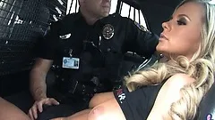 She puts on a show to get out of the ticket and he takes advantage of it