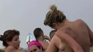 Sexy nudist  young chicks sunbathing on a nude beach