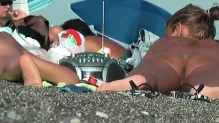 Sexy nudist babes filmed playing on the nude  beach