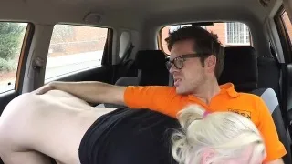 Instructor bangs driving student in car