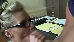 Tired of all the paperwork, the hot blonde decides to have some fun in the office