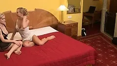 Sweet babes in bed talking dirty and teasing each other in a movie featuring Silvia Saint