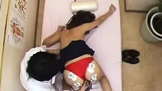 Sweet Japanese girl has a masseur working his hands on her