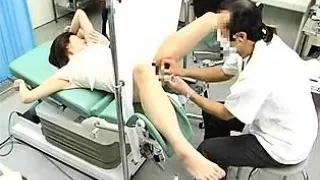 Slim Asian babe has a kinky doctor fingering and toying her