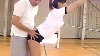 Asian schoolgirls in the gym get one on one instruction and