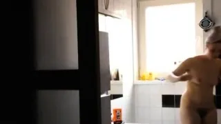 My naked mom not aware of me filming her