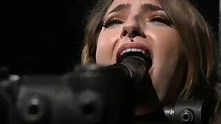 Babe in device bondage gagged with dildo