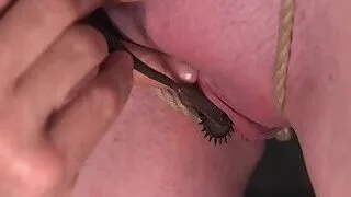 Master rubs pussy to slut with spur