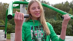 Teen lesbian babes play with toys after a workout indoors