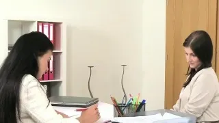 Tanned female agent with strap on bangs slim beauty