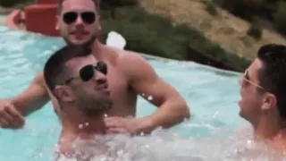 Muscular outdoor hunks spitroasted in the sun