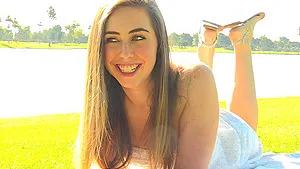 Outdoor picnic strip show by a beautiful brunette teen Lacey