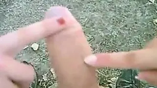 Girl Plays With A Cock Outside In Public