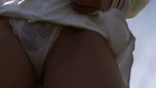 This clip starts with an outdoor upskirt scene, as Maria