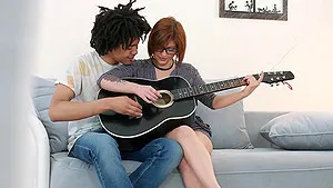Short haired nerdy babe Angelin Joy fucked by her guitar teacher