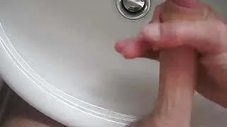 Jerk off and cumshot in basin