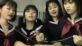 Four Japanese Schoolgirls Playing With A Cock