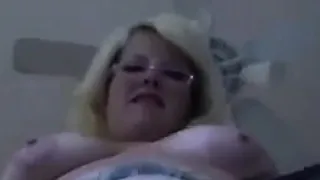 Mature Blonde Woman Does A Striptease