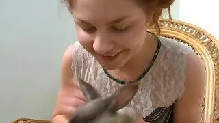 Hottie strips on a couch