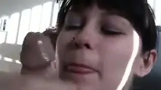 Busty Tattooed Slut Giving A Handjob