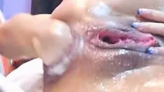 Russian babe double fists pussy and fists her ass