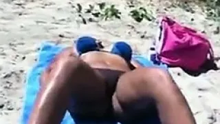 Beach Babe Getting A Tan