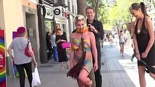 Busty cutie body painted in public