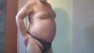 Fat boy dancing in g string