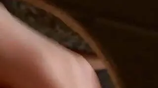 Blonde with a dildo at the gloryhole