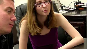 Nerdy brunette Jay Taylor masturbates while sucking a glory hole cock