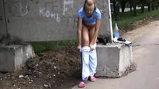 Cute chick wets her soft sporty breeches