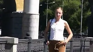 Shy amateur chick pissing through pants