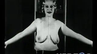 Natural blonde makes a strip show in 20s porn film