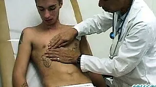 College boy gets examed by doctor.
