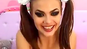 Cam girl with pigtails gagging on dildo