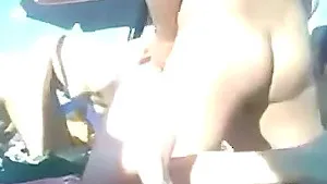 Kinky video of people sunbathing and having fun on a nudist beach