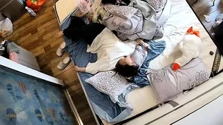 Cute amateur asian web cam girl playing with her toy