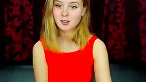 Blue eyed blonde sexy lady strips for cam