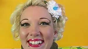 Tattooed blonde in stockings gets shafted by a big black cock